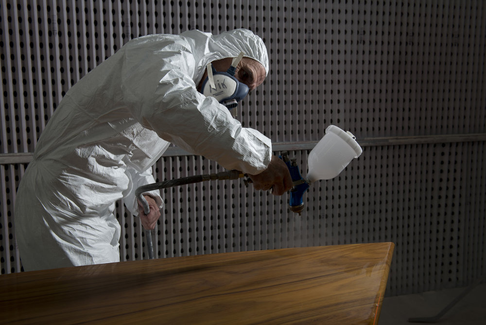 Spray application of finishes
